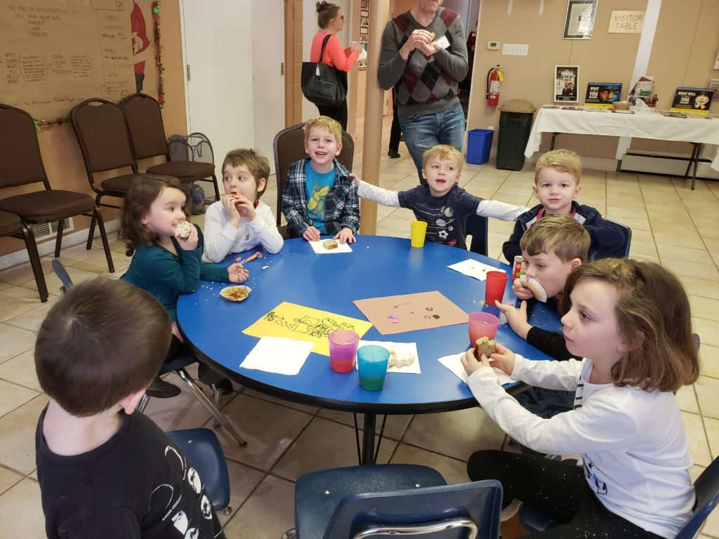 Children enjoying coffee hour