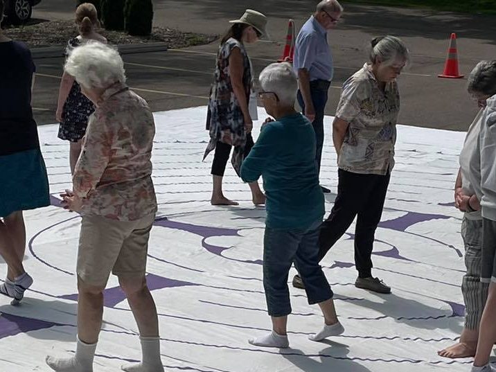 Members practice walking meditation thru a labyrinth